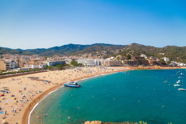 istock Sandy beach drenched in sun. Ideal for travel and tourism content. 2166778524