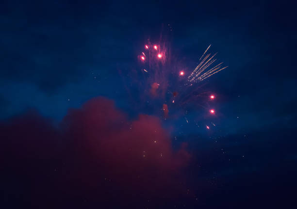 fireworks explosion in the sky (circle shine blue red independence day) fourth of july celebration background with smoke texture firework fire work works sky blue