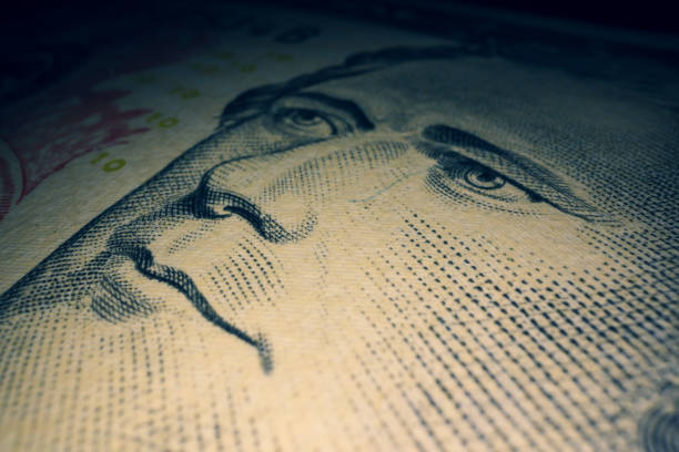 Smiling President Alexander Hamilton, one of the founding fathers of the United States. 10 USD banknote close-up. Concept of satisfaction.