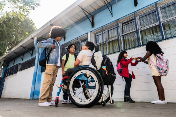 istock Student friends talking on schoolyard 2166780482