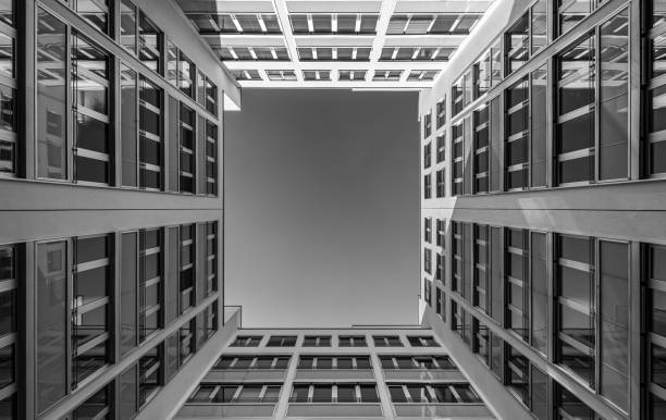 istock Low angle view of a modern office building 2166780536