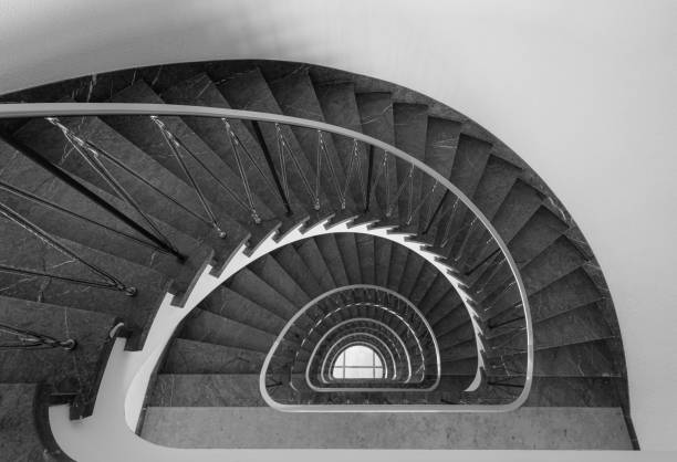 Spiral staircase with red railing