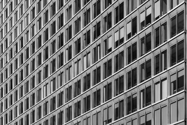 Germany, Berlin, Kreuzberg, August 06, 2024 -Full frame of windows in a row of a modern office building