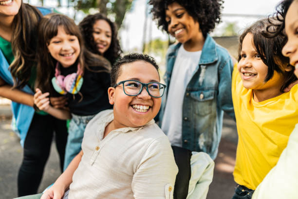 istock Happy students on schoolyard 2166780626