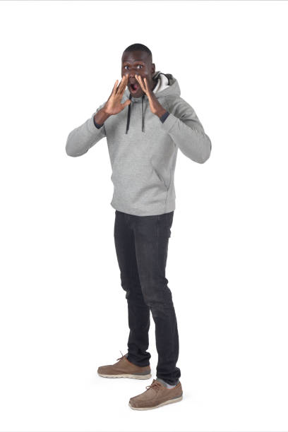 istock man screaming with his hands on his face looking at a camera 2166781517