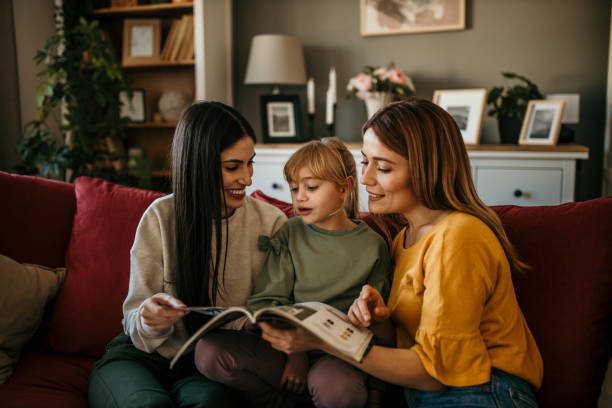 istock Family reading a book together 2166782457