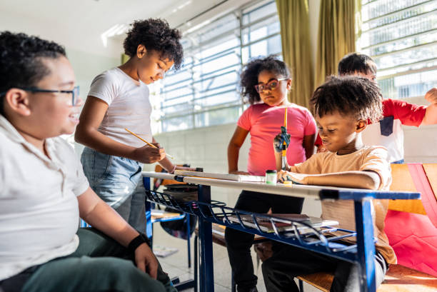 istock Students painting on classroom at school 2166782885