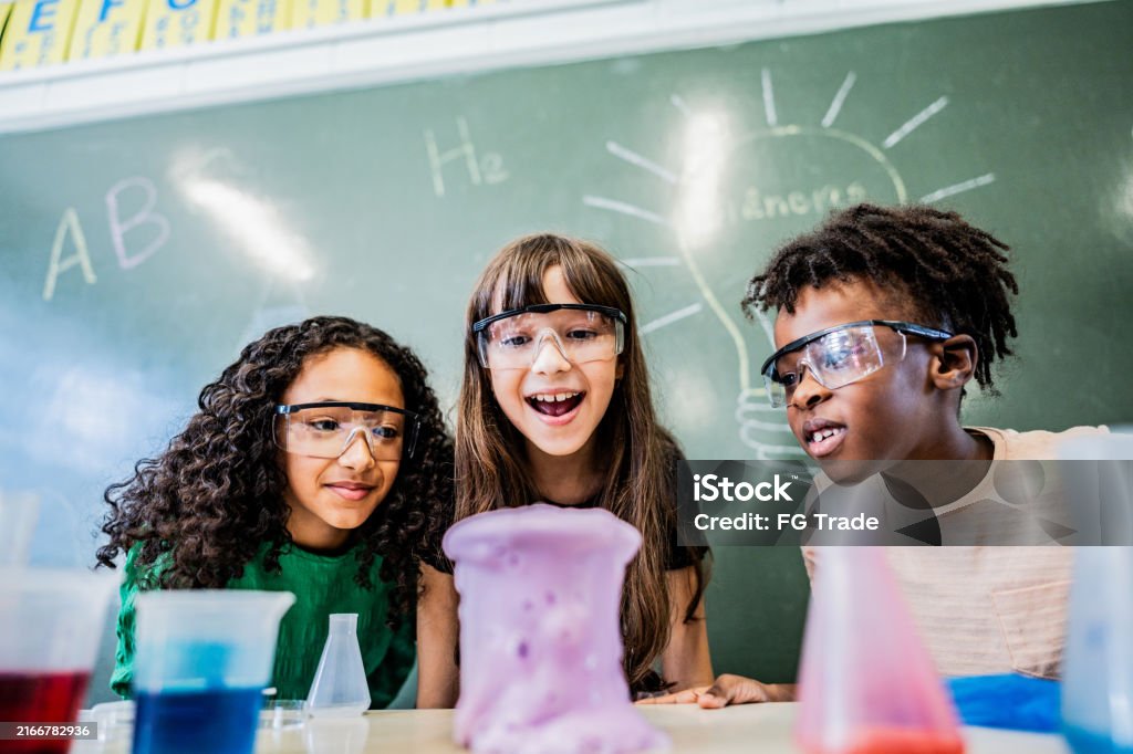 Experiment Classrom Students Doing An Experiment On Classroom On School Stock Photo ...