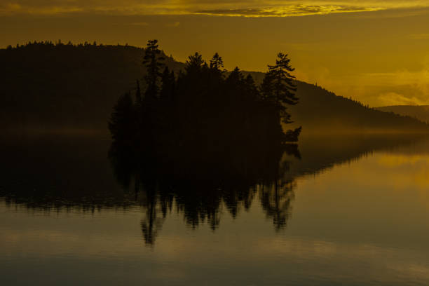 Sunset over a magnificent fishing lake in the Canadian forest