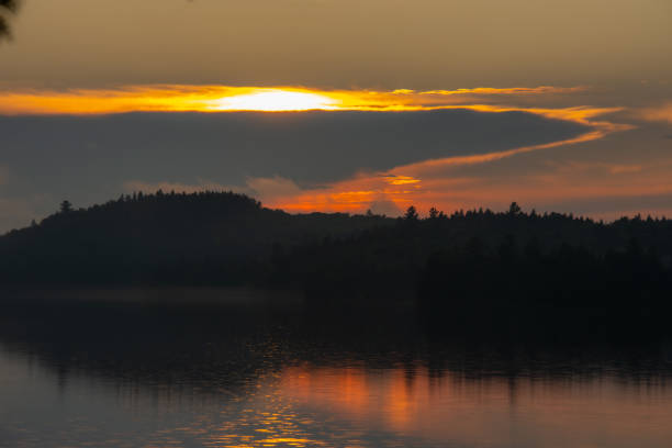 istock Sunset over a magnificent fishing lake 2166783618
