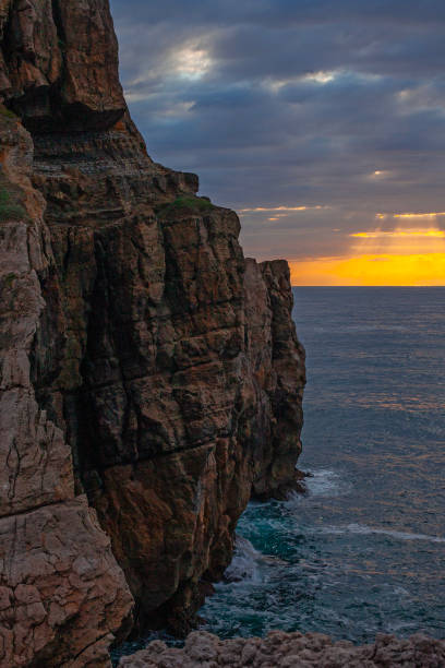 istock Sunset with beautiful clouds and rays on the Atlantic ocean cost in Cantabria, spain 2166784597