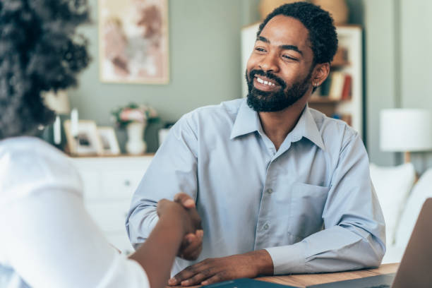 istock People shaking hands after meeting 2166785884