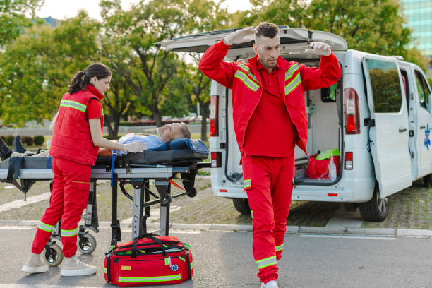 istock Emergency medical team assisting patient outdoors. Stressful day at work 2166793594
