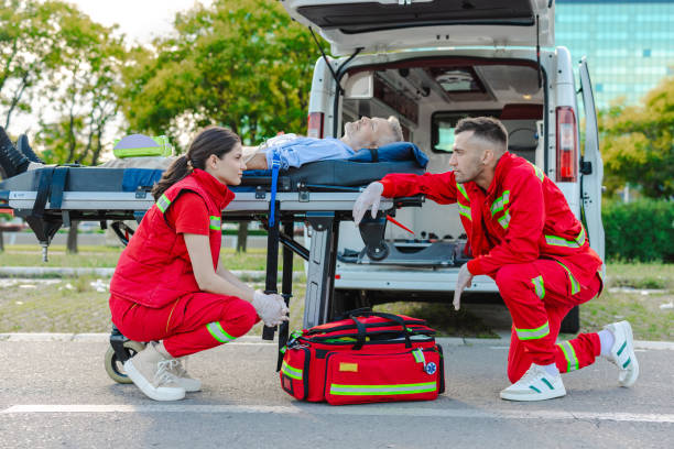istock Emergency medical team assisting patient outdoors. Stressful day at work for young doctors 2166793804