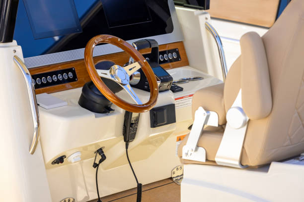istock Luxury motorboat steering wheel and control panel, background with copy space 2166793831
