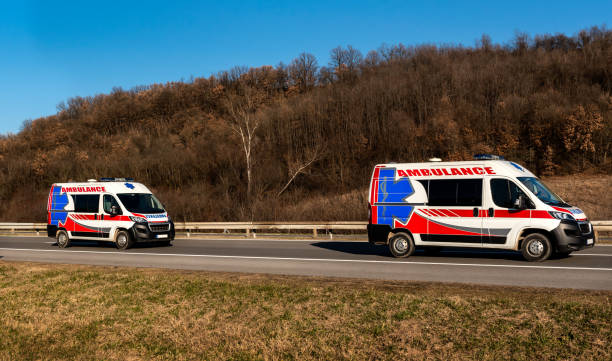 istock Two ambulance vans on highway 2166800319