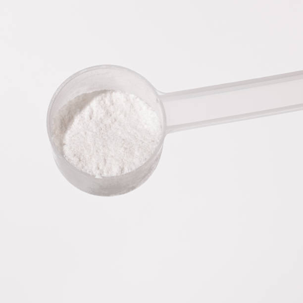 istock sugar in a spoon, proteine powder scoop 2166802547