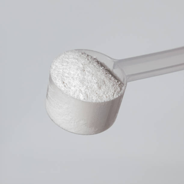 istock sugar in a spoon, proteine powder scoop 2166802575