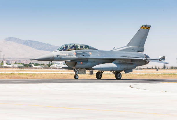 istock F-16 Fighting Falcon fighter jet on runway 2166802886