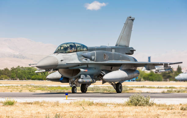 istock F-16 Fighting Falcon fighter jet on runway 2166802893
