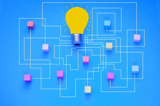 istock Business concept,collaboration,cooperation,teamwork, innovation,human resources,recruitment,team building, wooden cubes and lightbulb 2166803980