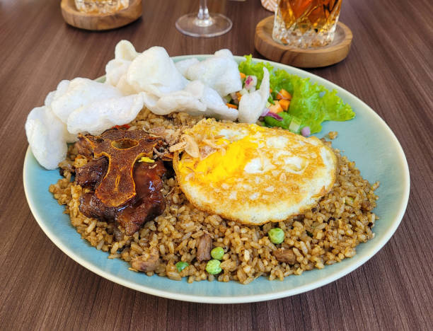 Nasi goreng buntut served with ox-tail and a fried egg.