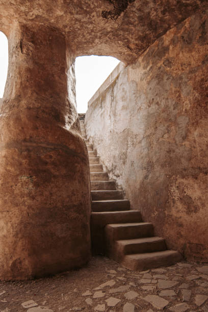 istock stairs ascending from a ruin in the desert 2166805301
