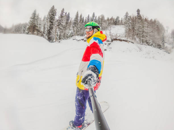 istock Skier skiing downhill during cloudy sunny day in high mountains 2166806462
