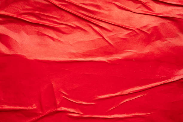 istock Blank red crumpled and creased paper poster texture background 2166810406