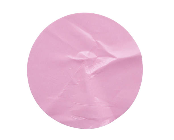 istock Blank pink round adhesive paper sticker label isolated on white background 2166810443
