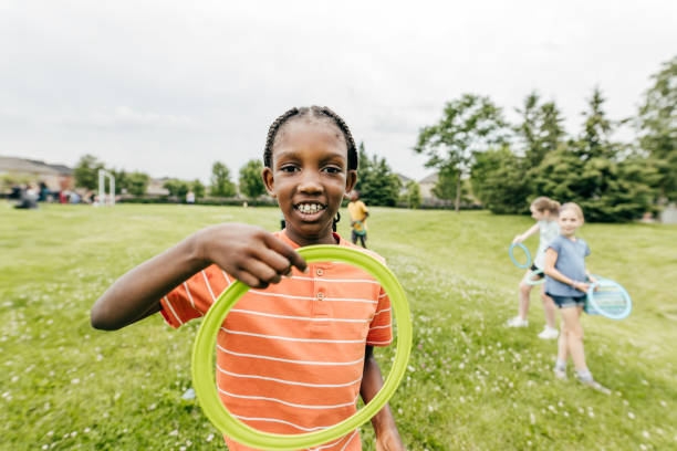 istock Frisbee Fun: Catching Memories in the Park 2166810501