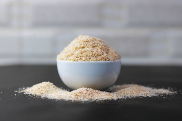 istock Psyllium Husk (Isabgol) in ceramic bowl on a black background 2166811894