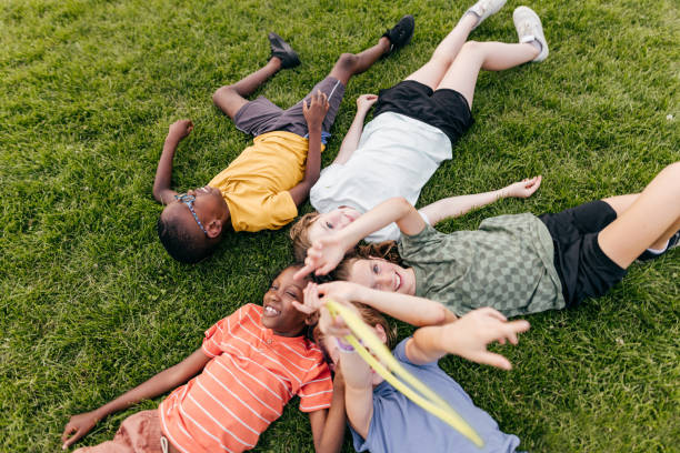 istock Cloud Watching: Friends Sharing Quiet Moments 2166813962