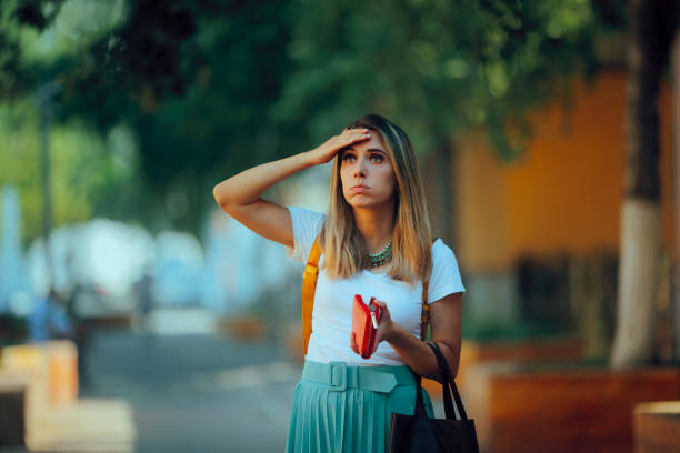 istock Stressed Woman Looking Inside the Waller Feeling Poor 2166814072