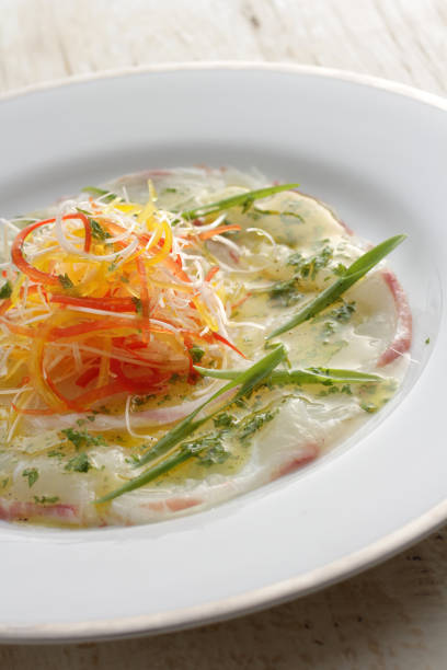 Fish carpaccio is a typical example of a Western dish with a Japanese twist.