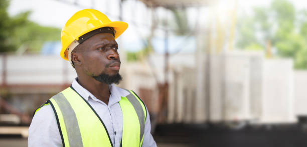 istock Engineer man on construction site, Foreman worker checking project at precast concrete factory site 2166815958
