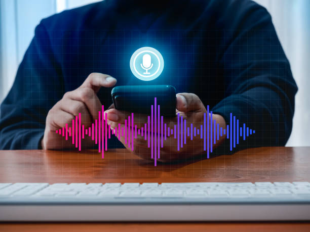 istock Conversation voice search application technology concept. Digital sound wave audio graphic on smartphone while man press on virtual microphone button. AI conversation assistant automation bot tools. 2166823094