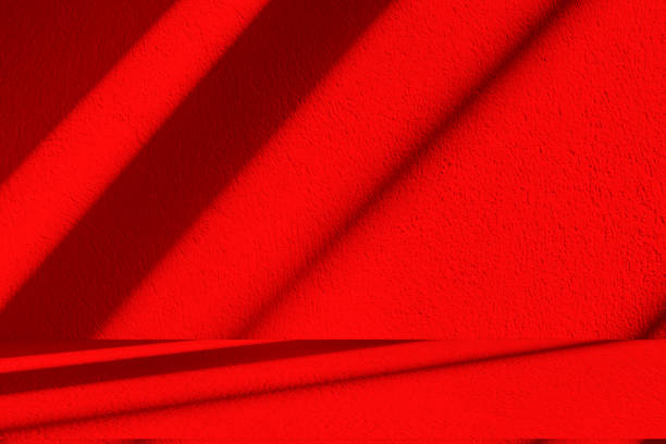 Studio style background wall decoration presentation uses white and red tones. with shadows cast from a nearby window, concept creating a decorative