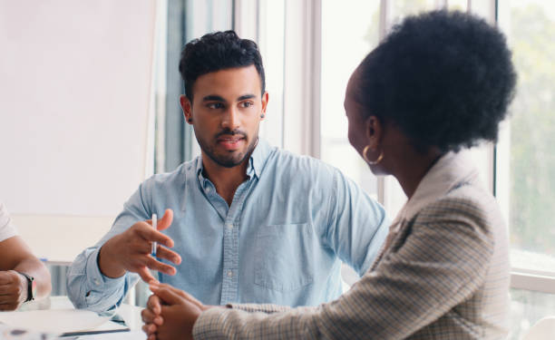 istock People, solution or strategy discussion in meeting for revenue information or organizing project. Review, talking or company growth ideas in office for startup business, teamwork or group planning 2166832935