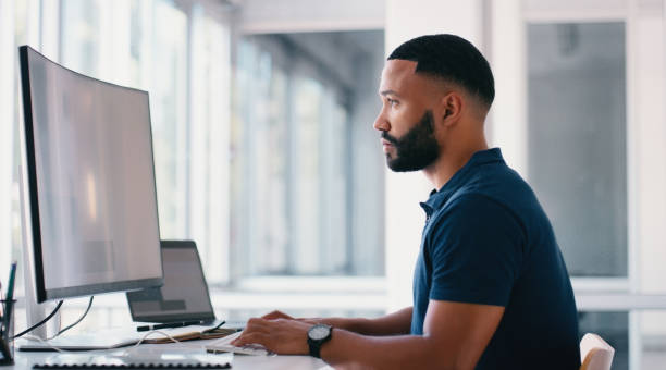 istock Business, man and computer with typing, internet and research for article, online reading and email for publishing. Person, copywriting and journalist with pc, connection and approval with network 2166832980