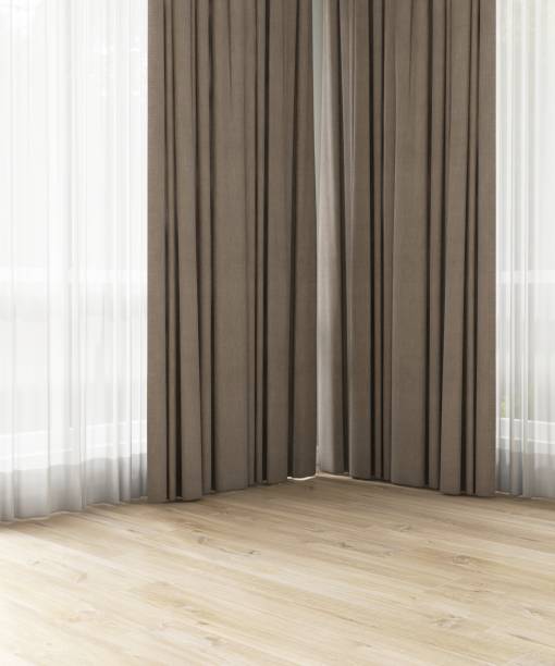 istock Empty room with double layer curtain, brown blackout and white sheer curtain in sunlight from backyard with trees on laminated parquet floor 2166833463