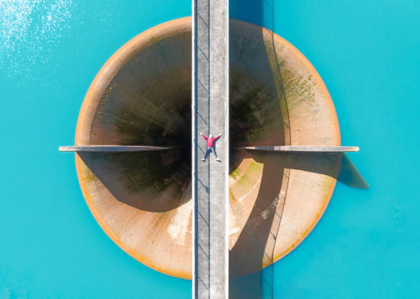 istock Bridge as seen from above surrounded by turquoise water. 2166841431