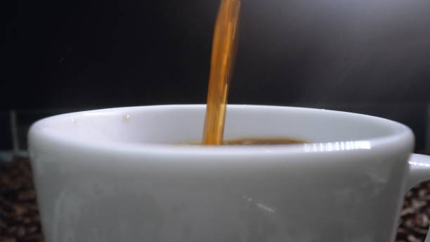 istock Coffee machine filling aromatic coffee in to cup with background. Comestible. 2166841904
