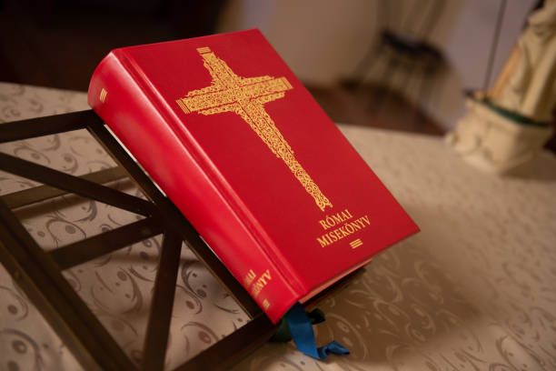 A detail of bibles and hymn books in an old church.