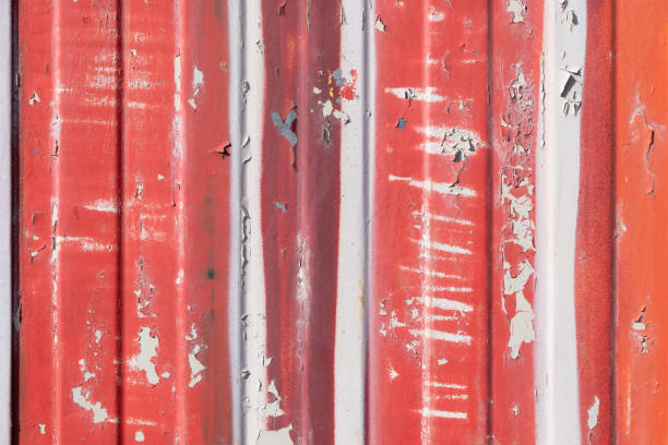 istock Metal surface covered with red and white paint. Cracked paint. 2166843105