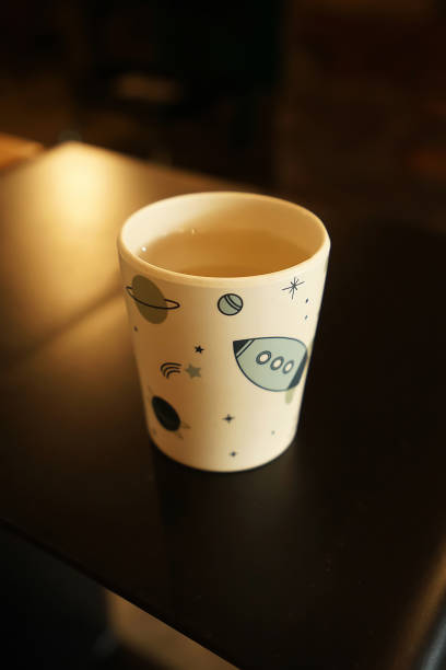 istock Close up kids cup full of spring water 2166843240