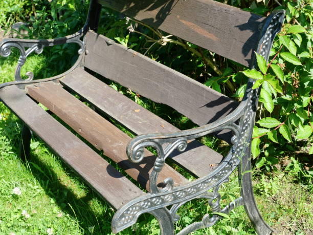 istock Cast iron garden bench with wooden slats 2166844802