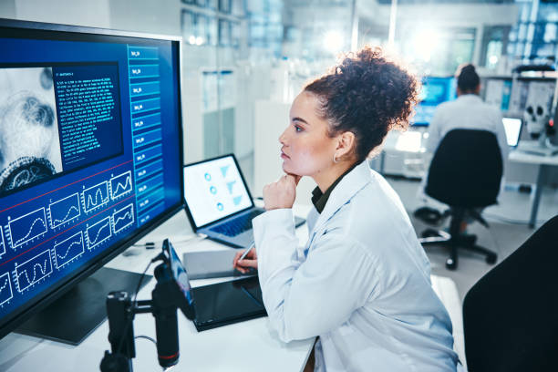 istock Computer, screen and scientist in laboratory with thinking, planning and analysis with medical research. Healthcare, woman doctor and brainstorm with digital for experiment, investigation and results 2166845308