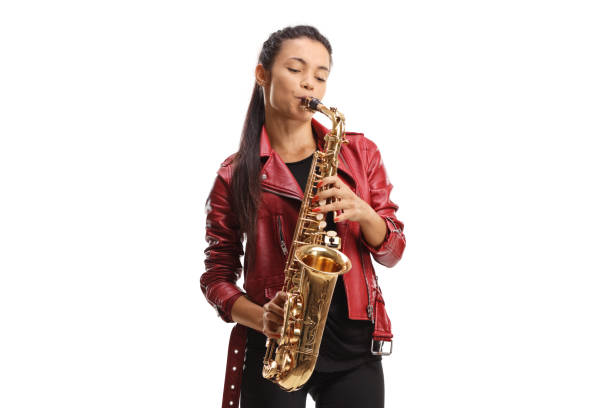 istock Female saxophonist in a red leather jacket playing sax 2166845450