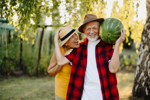 istock An elderly couple picking watermelons 2166848727